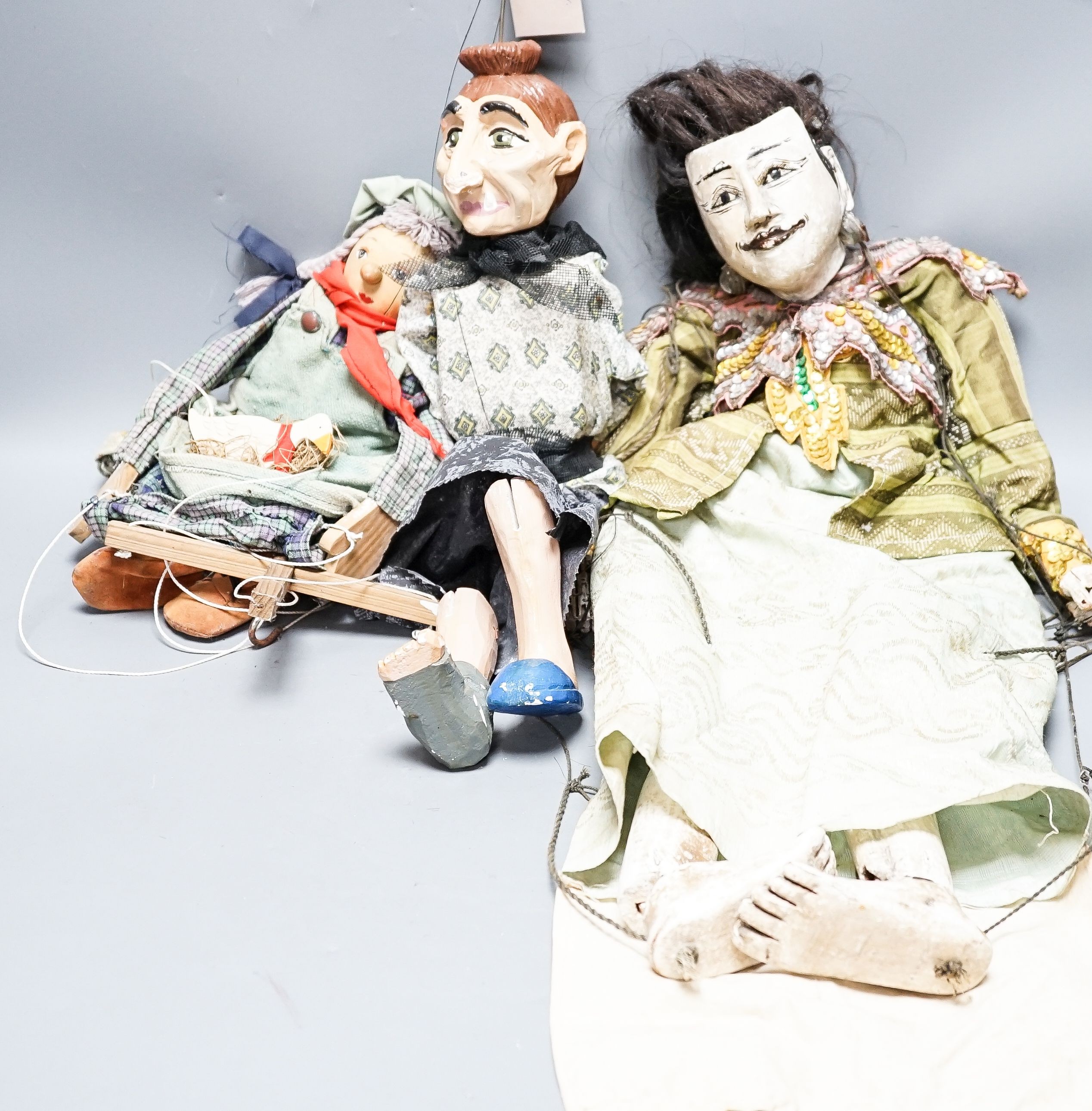 Early 20th century Burmese Yoke The theatre marionette and two Czech marionettes